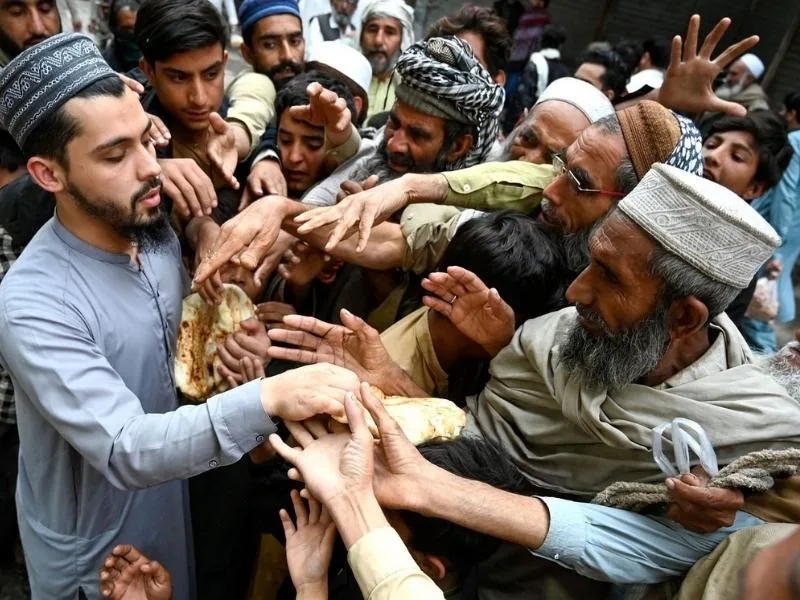 Rising prices of food and fuel in a Pakistan market amid inflation crisis, 2025