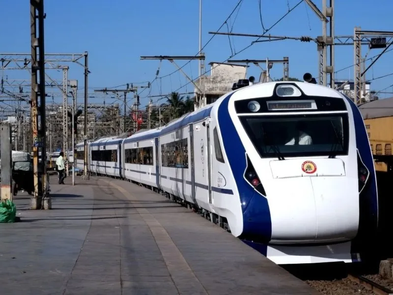 Passengers at Narsapur railway station awaiting Vande Bharat train services in 2025
