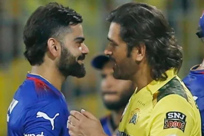 Kohli and Dhoni in a conversation during a Cricket presentation