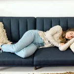 Person feeling sleepy after lunch in 2025, highlighting afternoon fatigue