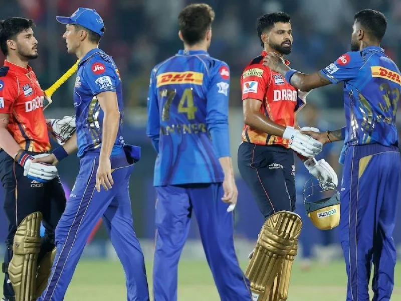 Punjab Kings players in action against Mumbai Indians during IPL 2025 match in Jaipur.