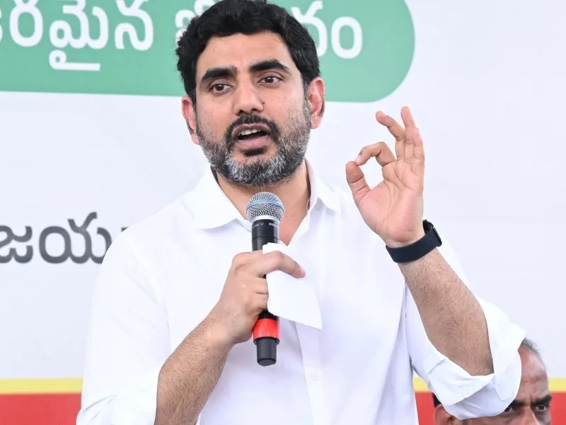 Students interacting with Nara Lokesh during the Shining Stars event in 2025