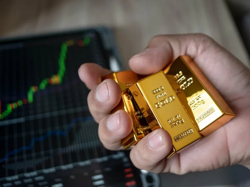 Silver bars with market data indicating price drop to ₹96,900 in May 2025