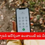 Smartphone displaying battery saving tips in Telugu for better battery life in 2025.