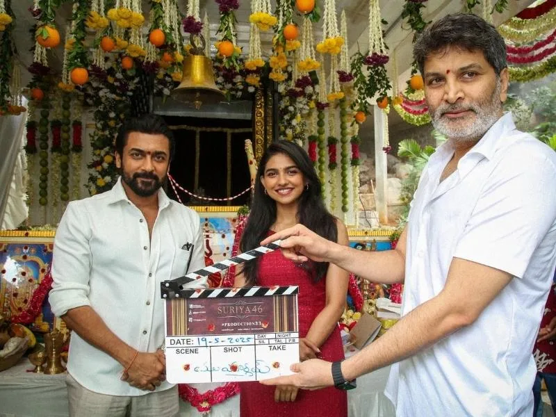 Trivikram Srinivas giving the first clap at Suriya 46 bilingual film launch in 2025