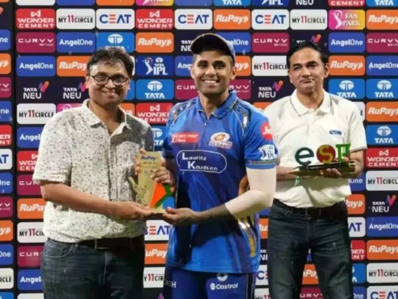 Suryakumar Yadav holding IPL 2025 POTM award ceremony at Wankhede