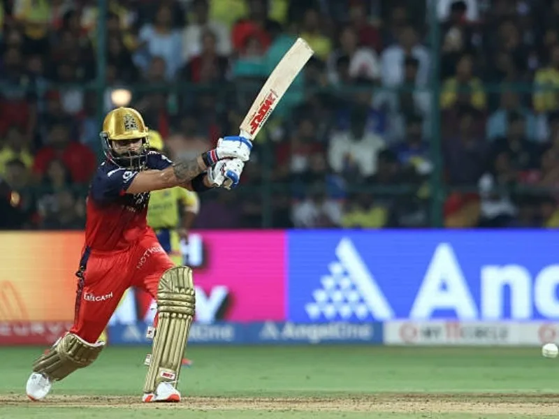 Virat Kohli batting at Chinnaswamy Stadium for RCB IPL 2025, leading the charge.