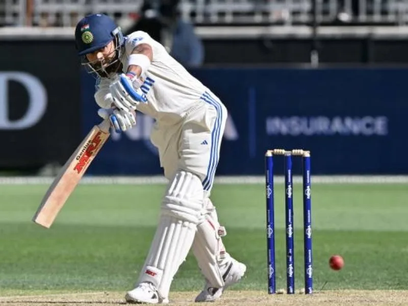Virat Kohli batting in a Test match, hailed as a legend alongside Gavaskar and Tendulkar