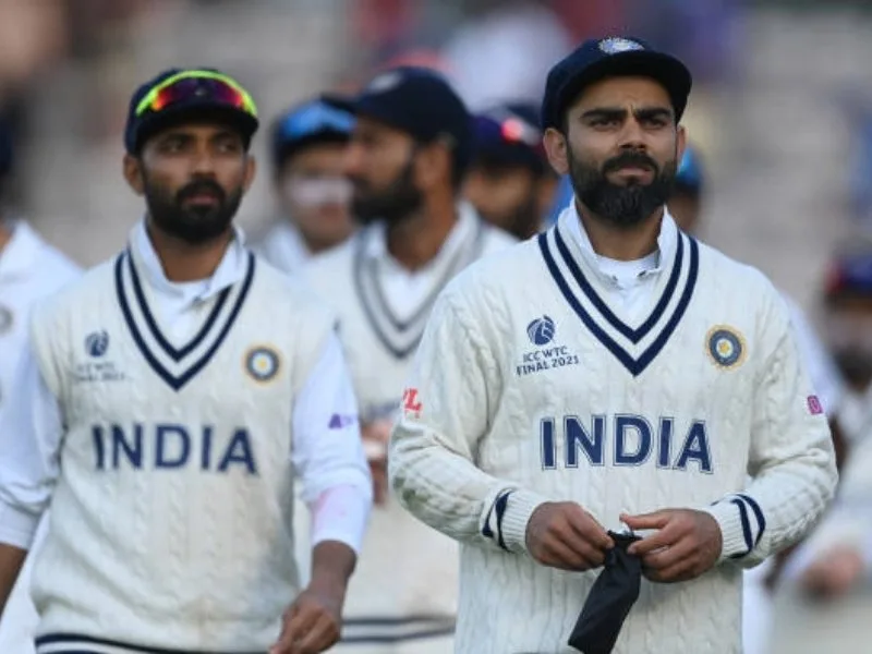 Virat Kohli leading India in a Test match, symbolizing his legendary captaincy.
