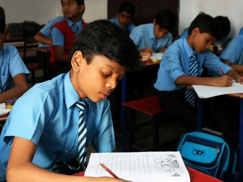 Andhra Pradesh Education Department distributing school textbooks for 2025 academic year.