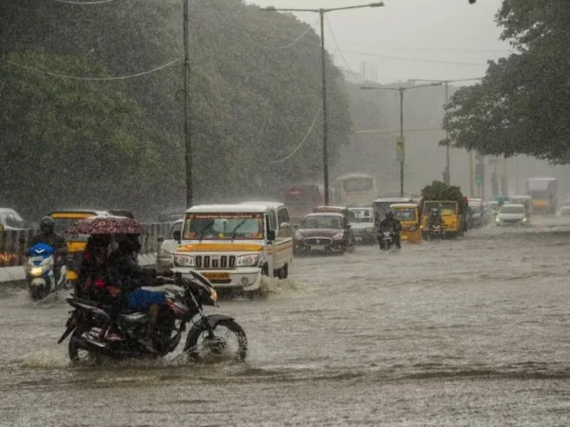 Warning signboard in Andhra Pradesh coastal area for heavy rainfall and cyclone in May 2025.