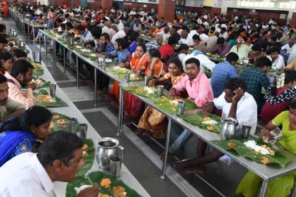 Devotees receiving Annadanam at a temple in Andhra Pradesh under CM Chandrababu Naidu’s 2025 initiative