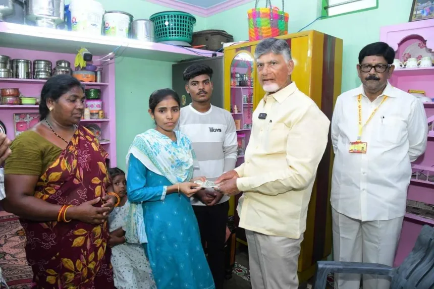 CM Chandrababu Naidu handing over pension to a beneficiary at Yalamanda village in 2025