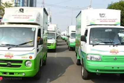 Andhra Pradesh ration door delivery vehicle distributing supplies to beneficiaries in 2025