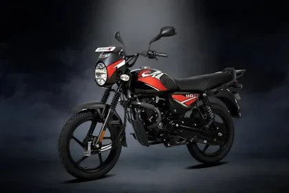 Bajaj CT 110X in Matte Wild Green parked on rural road with LED DRLs and rugged crash guard