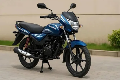 Bajaj Platina 110 motorcycle in Ebony Black Blue color parked on city street
