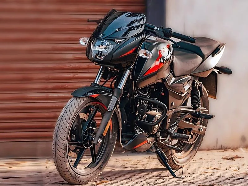Close-up of Bajaj Pulsar 150 semi-digital instrument cluster with tachometer and fuel gauge