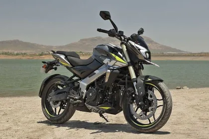 Bajaj Pulsar NS400Z in Brooklyn Black parked on city street with sharp LED headlamp and muscular tank