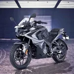 Bajaj Pulsar RS200 in Glossy Racing Red parked on city street with dual projector LED headlamps
