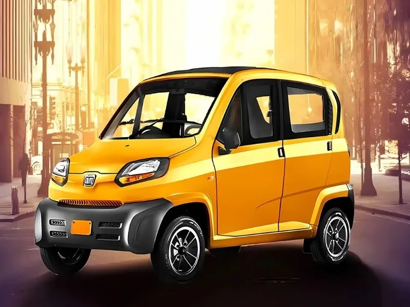 Interior of Bajaj Qute showcasing compact 4-seater cabin with analog instrument cluster and cloth seats