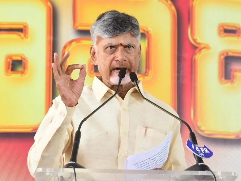 CM Chandrababu Naidu addressing tribal welfare meeting on job reservations in Andhra Pradesh 2025