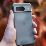 Google Pixel 8 smartphone on display with a promotional banner for a Rs.16,000 discount sale at Reliance Digital.