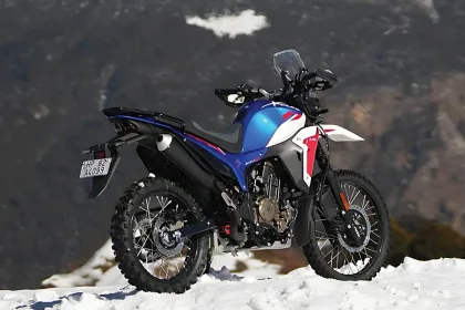 Hero XPulse 210 in Alpine Silver parked on off-road trail with LED headlights and rugged adventure design