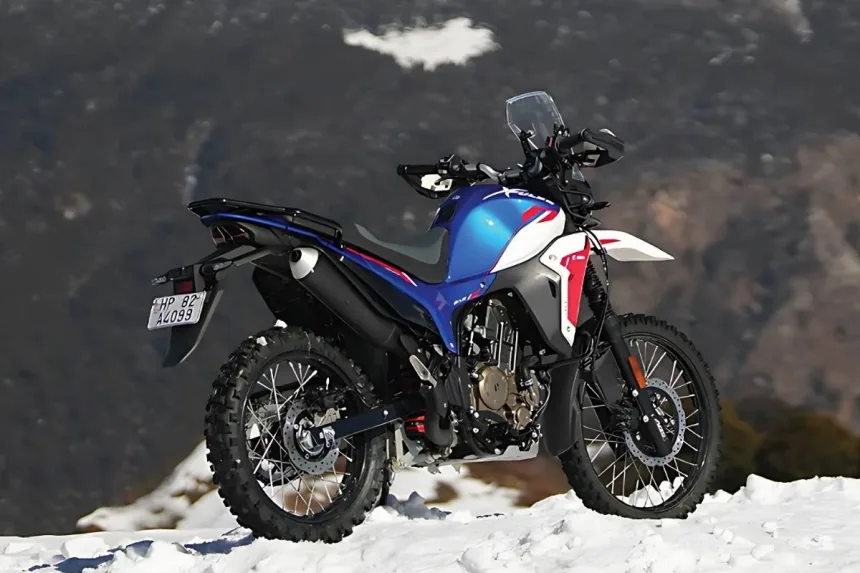 Hero XPulse 210 in Alpine Silver parked on off-road trail with LED headlights and rugged adventure design