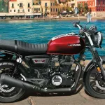 Honda CB350RS in Black with Pearl Sports Yellow parked on city street with retro LED headlamp