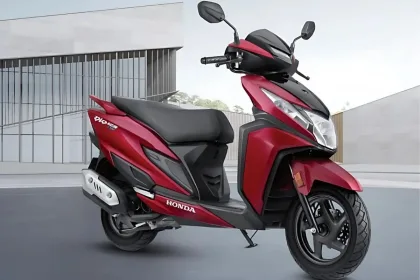 Honda Dio 125 scooter in Sports Red color parked on city street