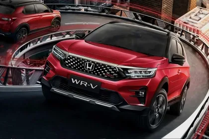Honda WR-V 2026 in Platinum White parked in city with LED headlights, showcasing stylish compact SUV design