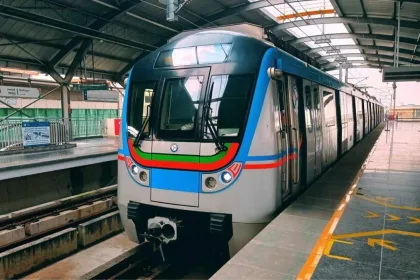 Hyderabad Metro train at a station with commuters facing new fare hike in 2025