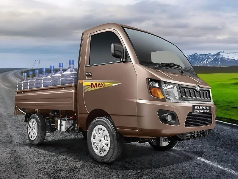 Interior of Mahindra Supro Profit Truck Mini showcasing analogue instrument cluster and ergonomic driver cabin
