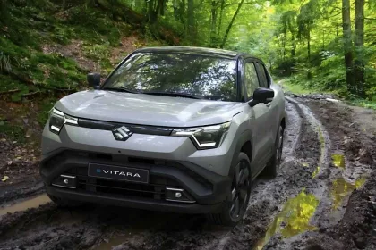 Maruti Suzuki e Vitara 2025 in Arctic White parked in city with LED headlights, showcasing stylish electric SUV design
