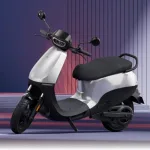 Ola S1 X electric scooter in Midnight Blue color parked on city street with LED headlight