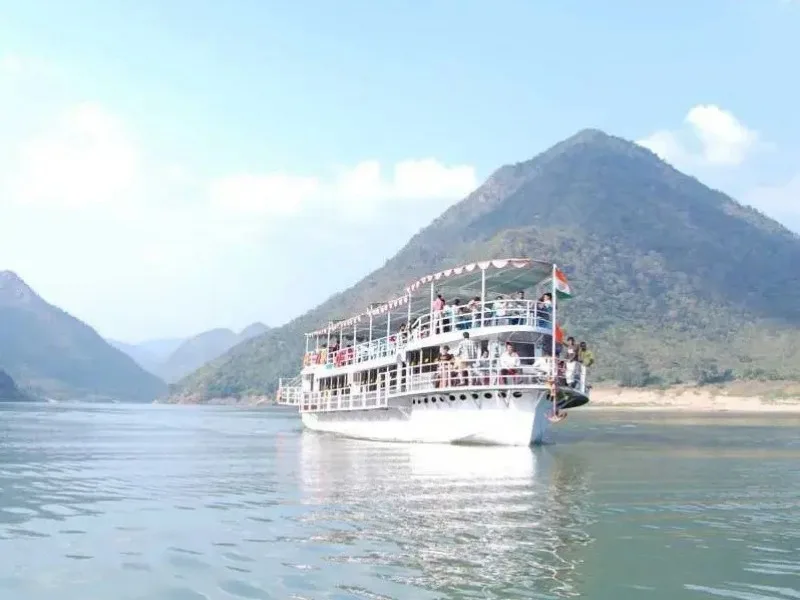 Signboard announcing Papikondalu yatra cancellation due to weather