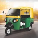 Piaggio Ape Auto DX BS6 in Green parked on city street with halogen headlights and 3-seater cabin