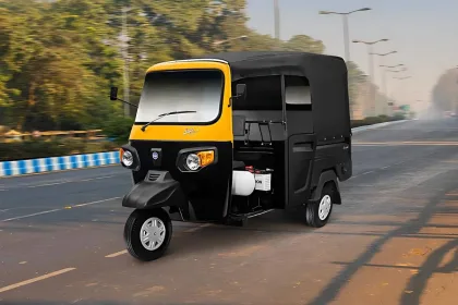 Piaggio Ape City Plus 2025 in Green parked on city street with halogen headlights and 3-seater cabin
