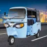 Piaggio Ape E-City in Green parked on city street with LED headlights and 3-seater cabin