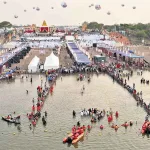 Devotees taking a holy dip at Triveni Sangamam during Saraswati Pushkaralu Kaleshwaram 2025