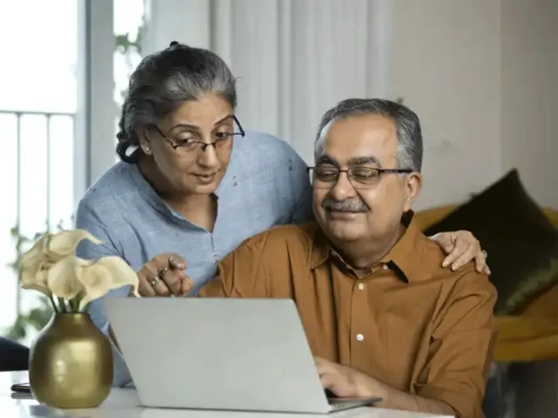 Senior citizen reviewing high FD interest rates for 2025