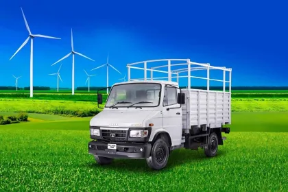 Tata 407 Gold SFC 2025 in blue parked in city with cargo deck, ideal for last-mile logistics