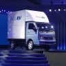 Tata Ace EV 2025 in white parked in city with cargo deck, showcasing eco-friendly design
