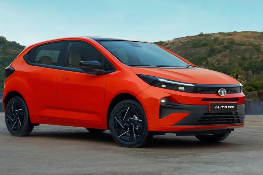 2025 Tata Altroz Facelift in Dune Glow parked on city street with LED headlights and flush door handles
