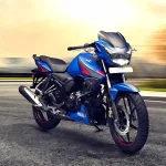 TVS Apache RTR 160 motorcycle in Racing Red color parked on city street with LED headlight