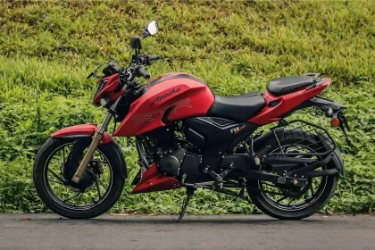 TVS Apache RTR 200 4V motorcycle in Matte Blue parked on city street with LED headlamp