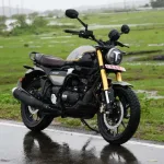 TVS Ronin motorcycle in Glacier Silver parked on urban street with LED headlamp