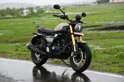 TVS Ronin motorcycle in Glacier Silver parked on urban street with LED headlamp