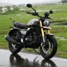 TVS Ronin motorcycle in Glacier Silver parked on urban street with LED headlamp