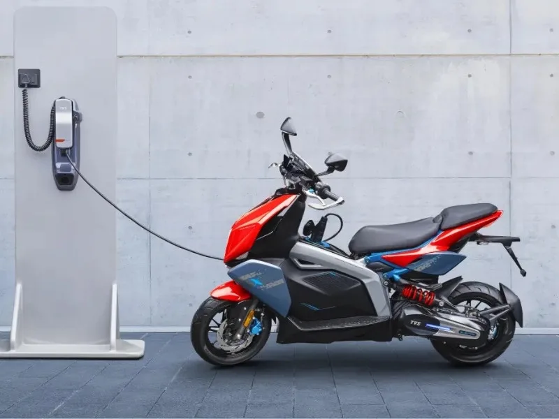 Close-up of TVS X electric scooter 10.2-inch TFT touchscreen display with SmartXonnect navigation